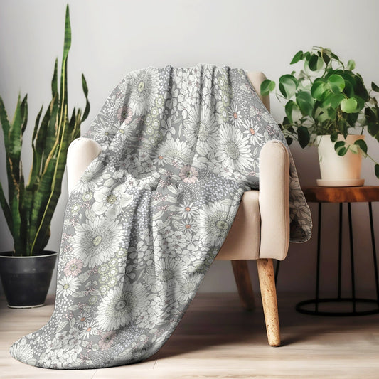 Snowy Field of Flowers On Grey Fleece Blanket